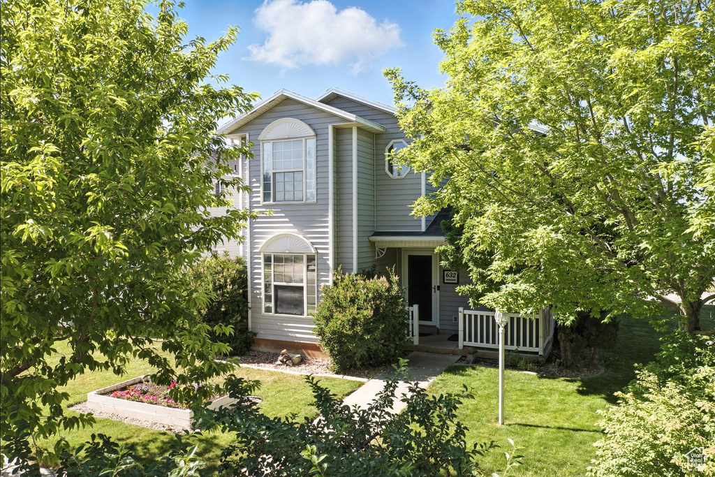 View of front of house with a front lawn