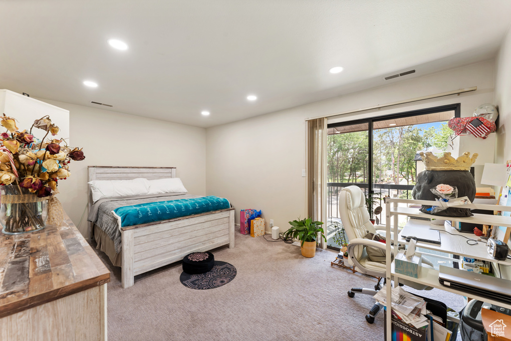 Carpeted bedroom featuring access to outside and recessed lighting