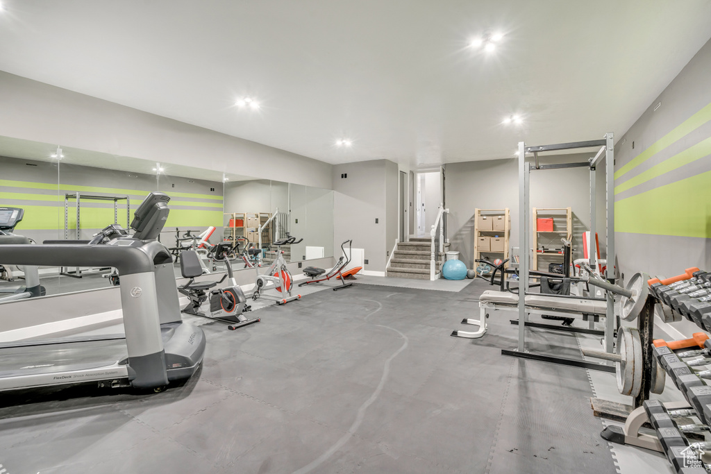 Workout area featuring recessed lighting