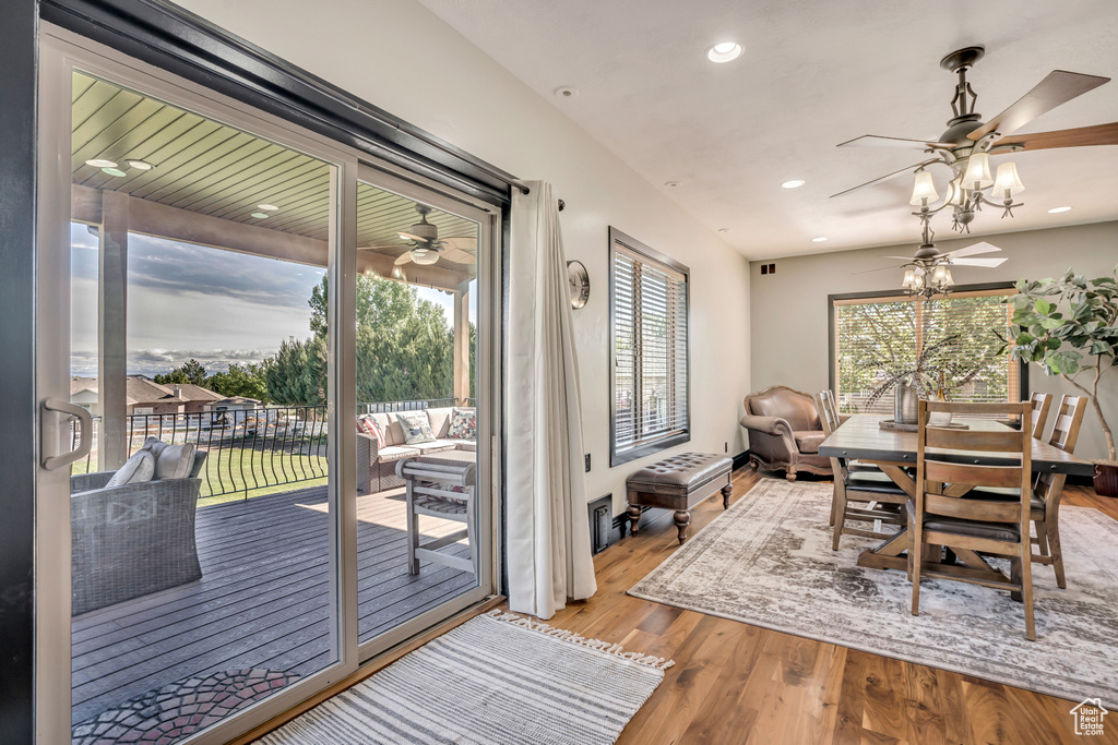 Dining area featuring a ceiling fan, wood finished floors, and recessed lighting