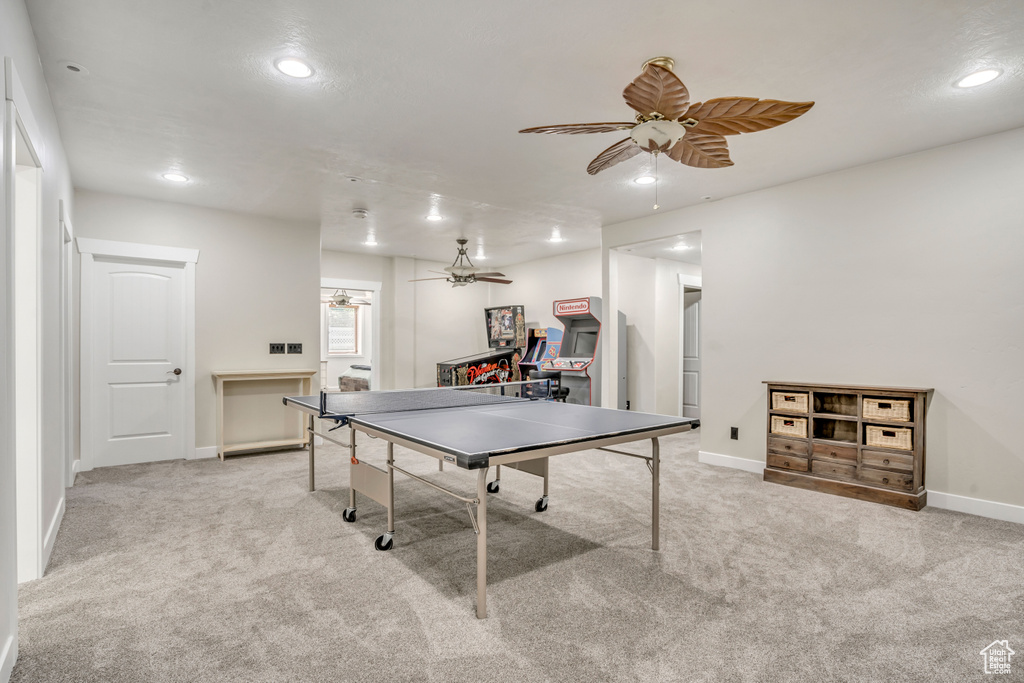 Game room with a ceiling fan, carpet flooring, and recessed lighting