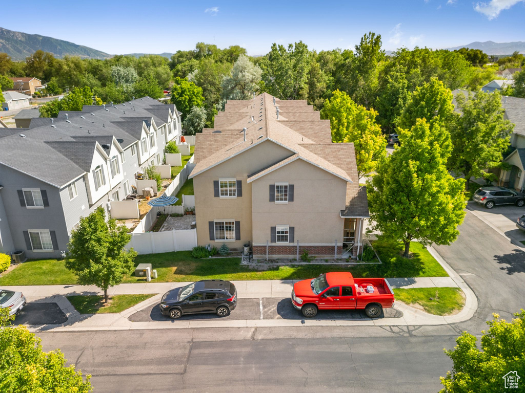 View of subject property with mountains