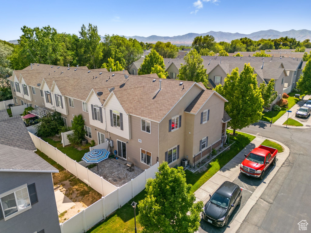 Aerial perspective of suburban area with mountains