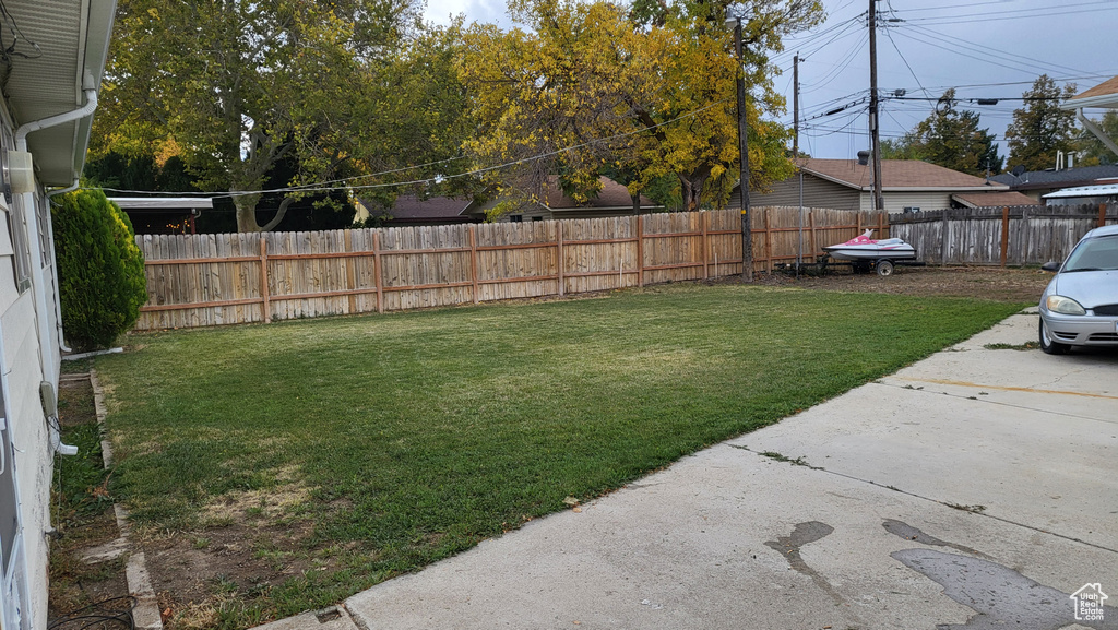 View of fenced backyard