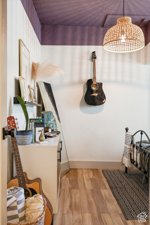 Detailed view of wood finished floors and baseboards