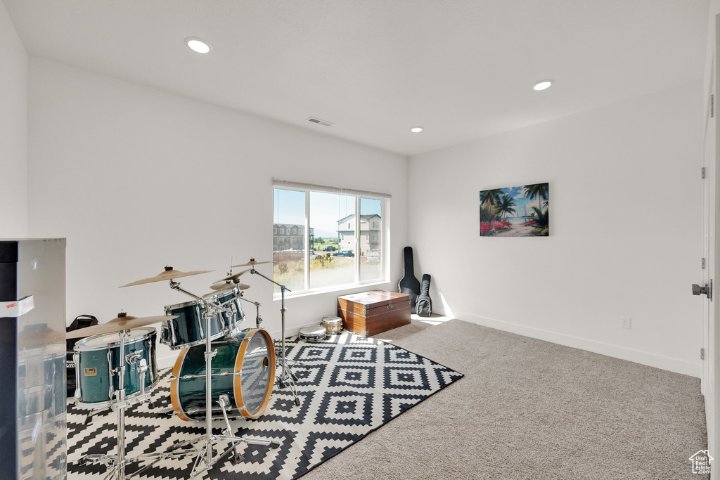 Playroom with carpet and recessed lighting