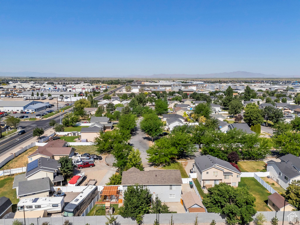 Aerial view of residential area with mountains