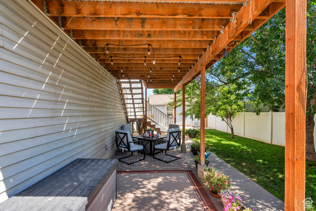 Fenced backyard with a patio area
