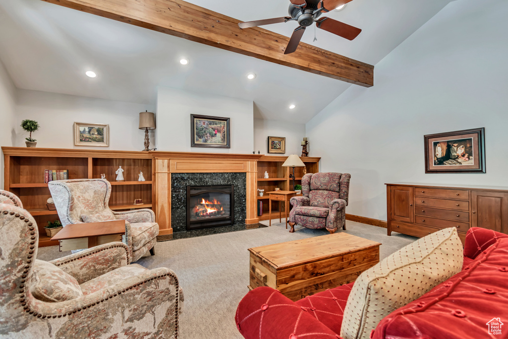 Carpeted living area with recessed lighting, ceiling fan, and a premium fireplace
