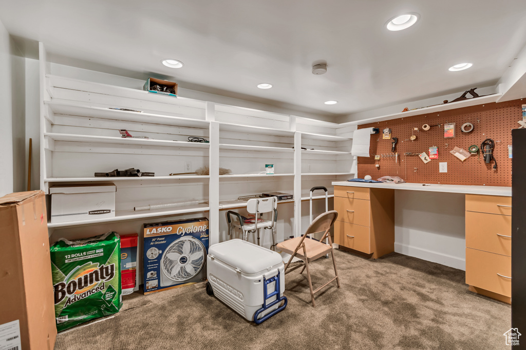 Carpeted bedroom with recessed lighting