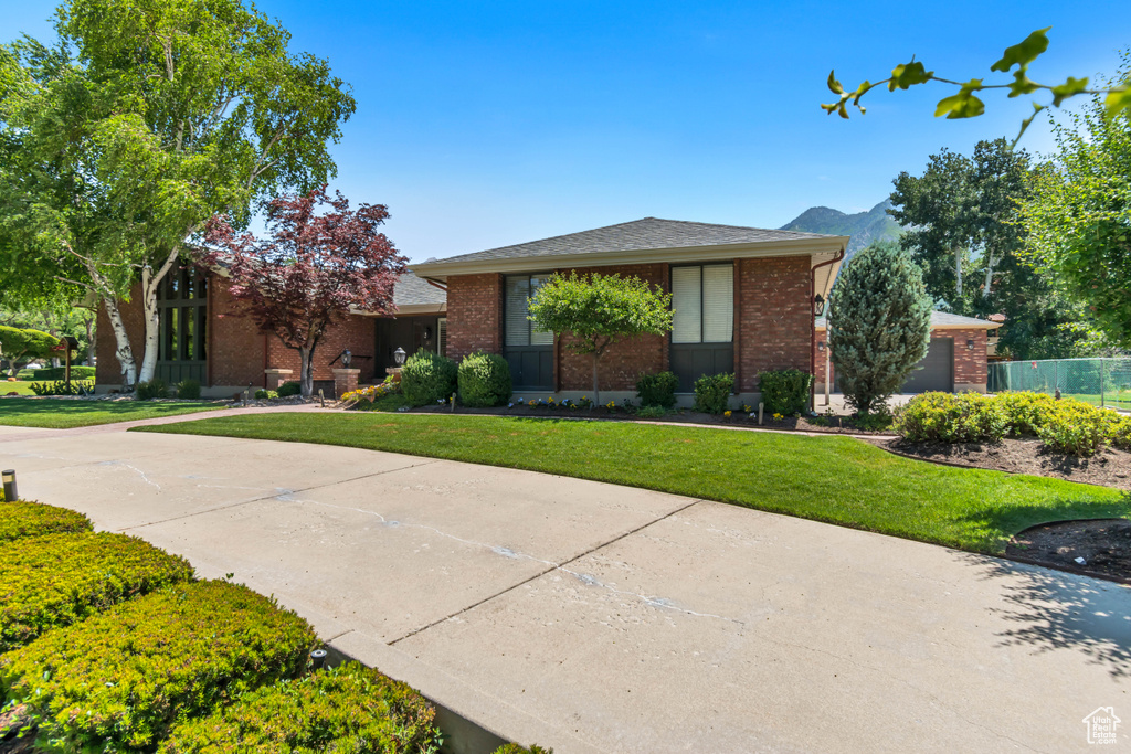 View of front of home with brick siding