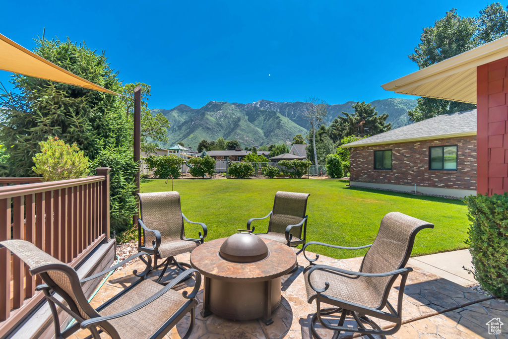 View of patio / terrace with a mountain view