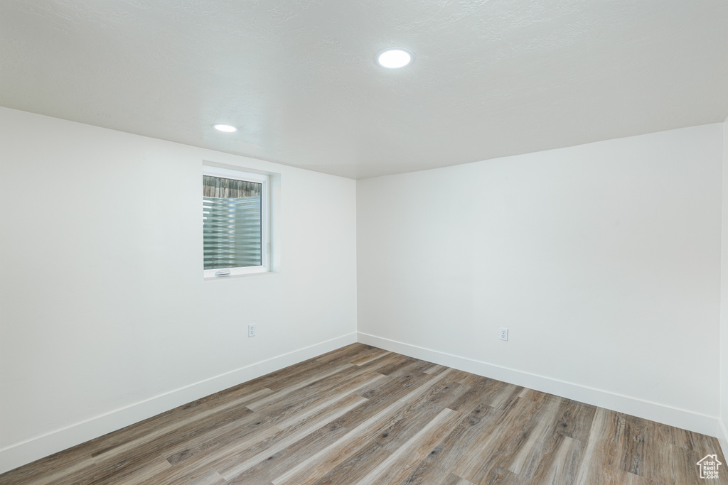 Unfurnished room featuring light wood-style floors and recessed lighting