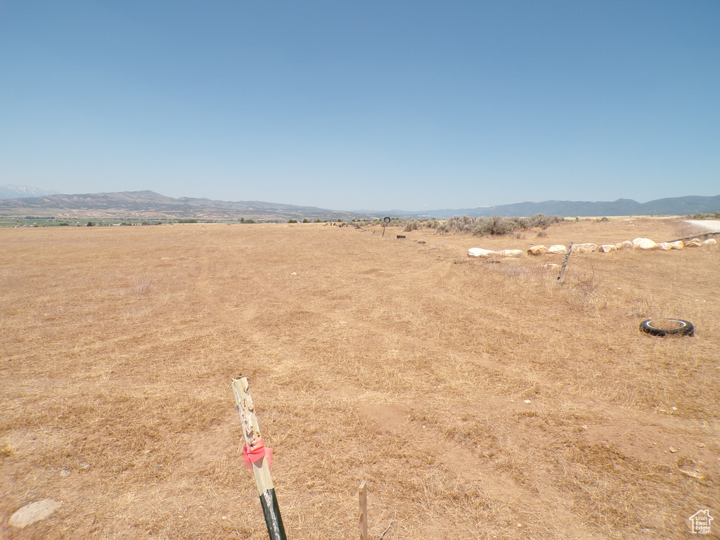 Aerial view of sparsely populated area with a mountain backdrop