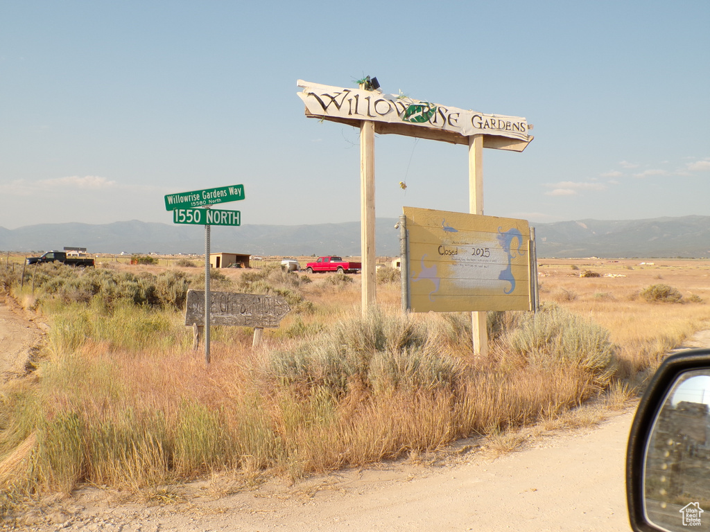 View of home\'s community featuring a mountain view and a rural view
