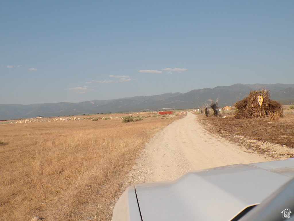 View of street featuring a mountain view and a rural view