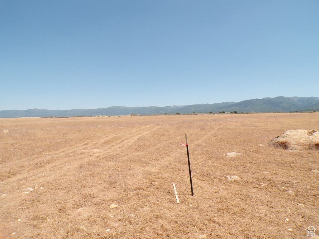 Surrounding community featuring a view of rural / pastoral area and a mountain view