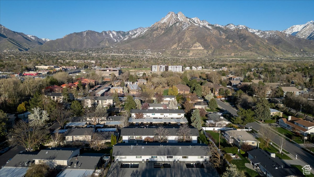 View of mountain background featuring nearby suburban area