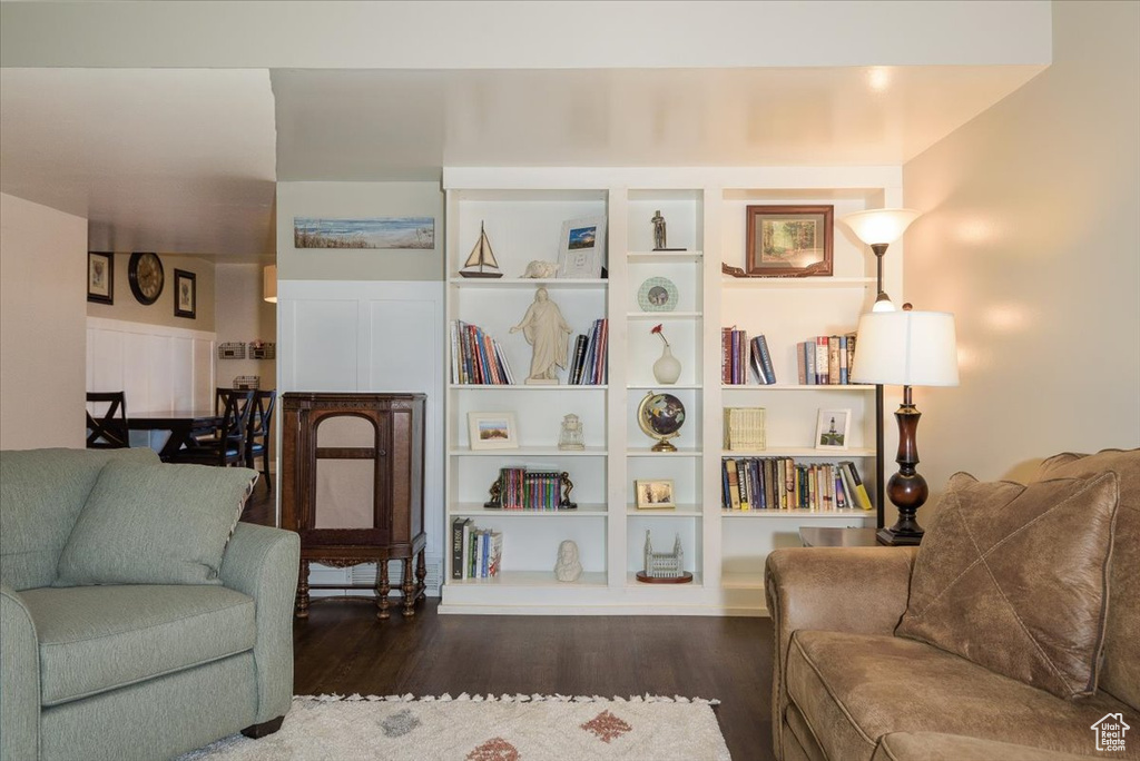 Living area with wood finished floors