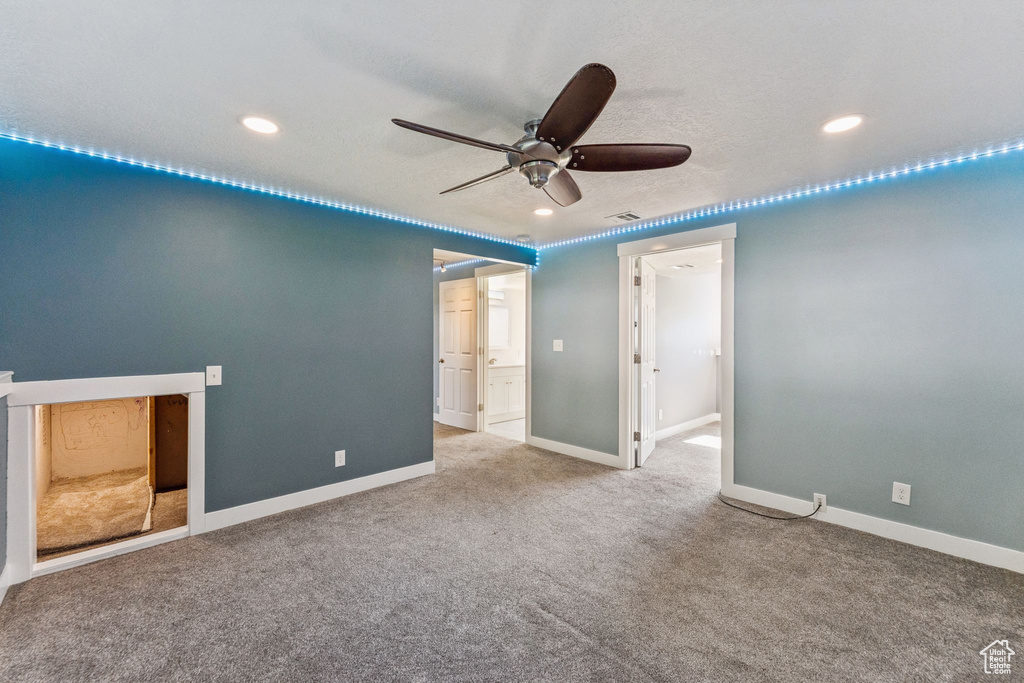 Unfurnished bedroom featuring recessed lighting and carpet flooring