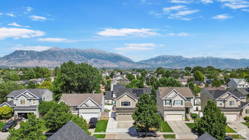 View of mountain backdrop with nearby suburban area