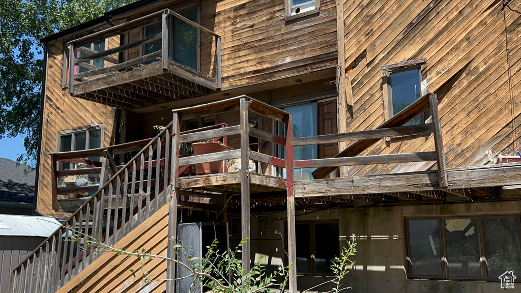 View of property featuring stairway