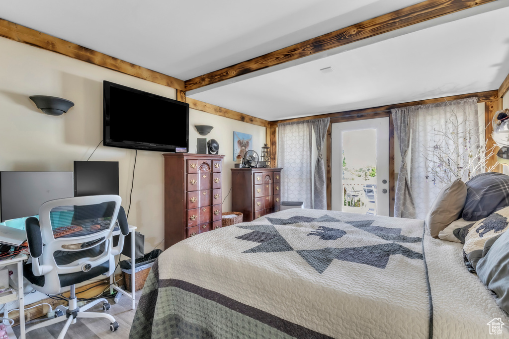 Bedroom with beam ceiling