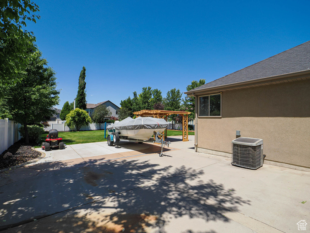 Fenced backyard with a patio area