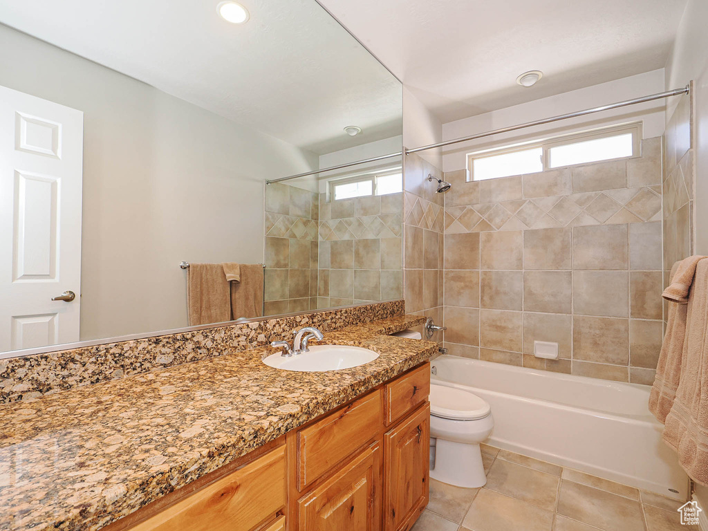 Bathroom featuring vanity and bathing tub / shower combination