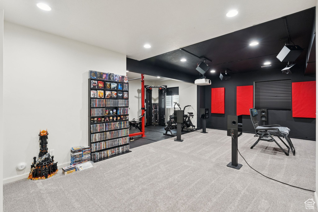 Workout room featuring carpet and recessed lighting