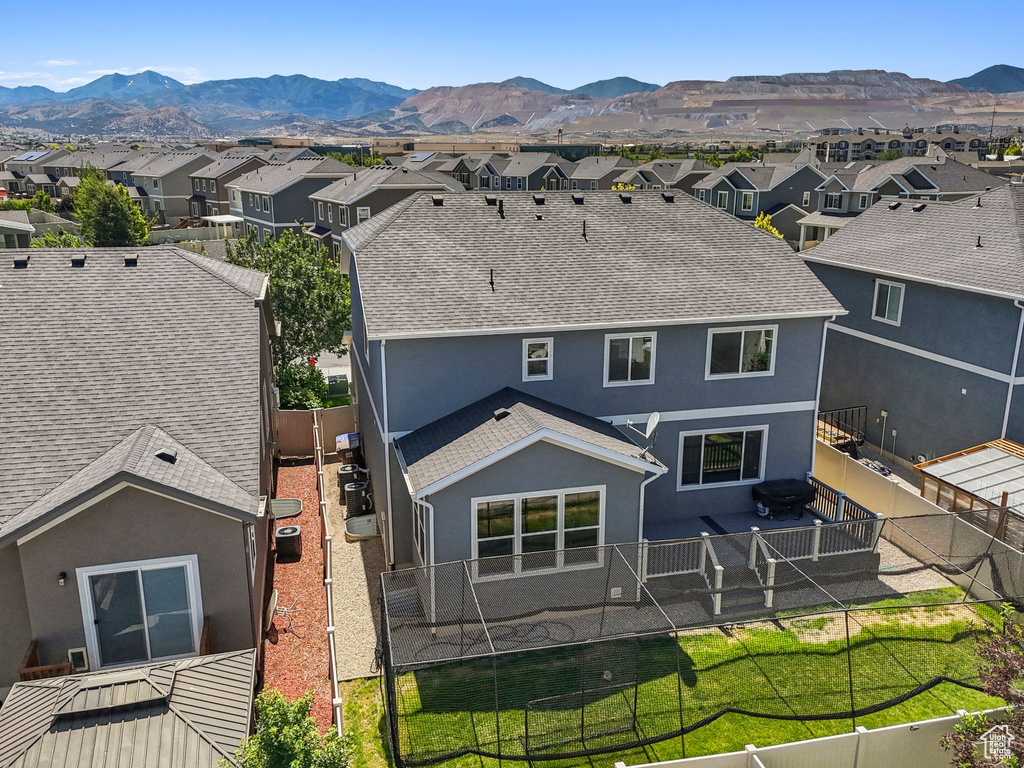 Aerial perspective of suburban area featuring mountains