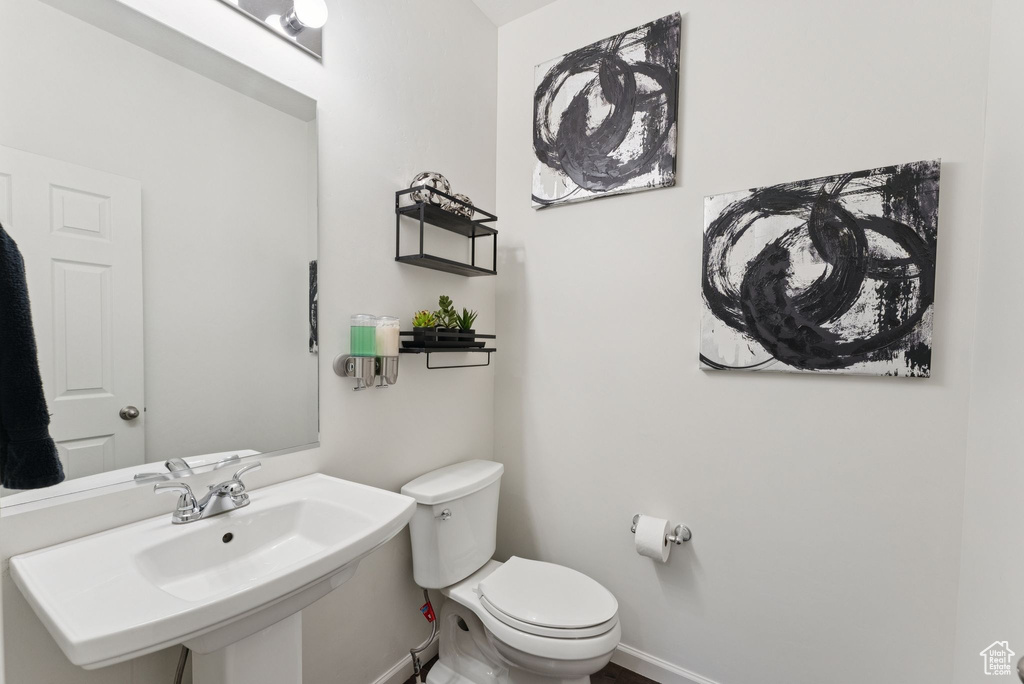 Half bath with baseboards