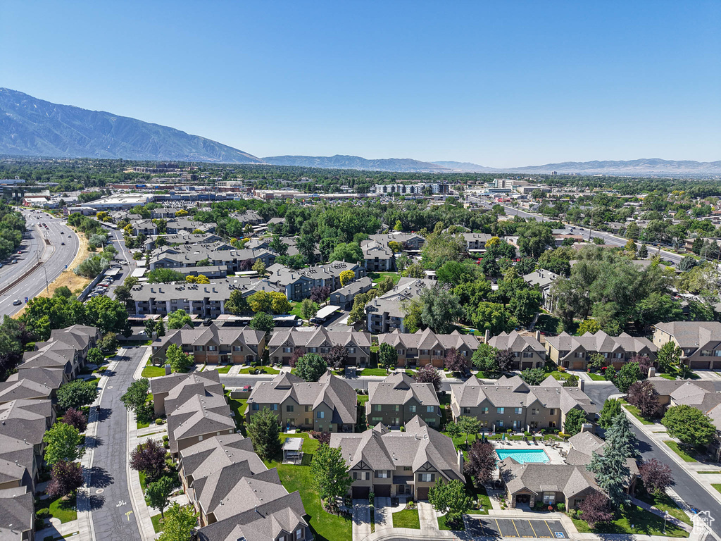 View of property location with nearby suburban area and a mountainous background