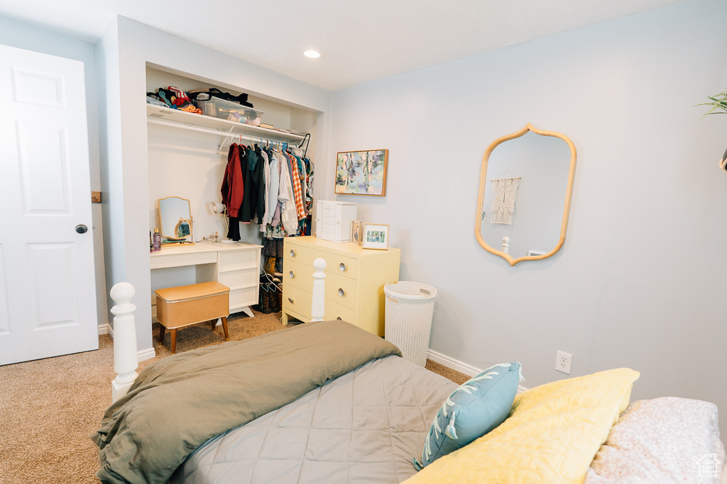 Bedroom featuring a closet, carpet flooring, and recessed lighting
