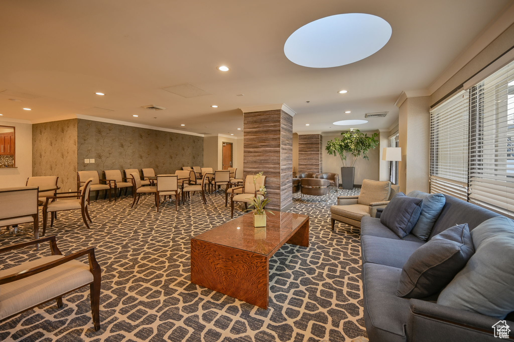 Community lobby featuring crown molding and recessed lighting