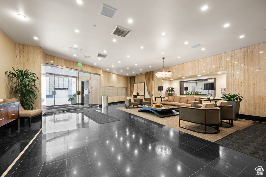 Lobby with wood walls and recessed lighting