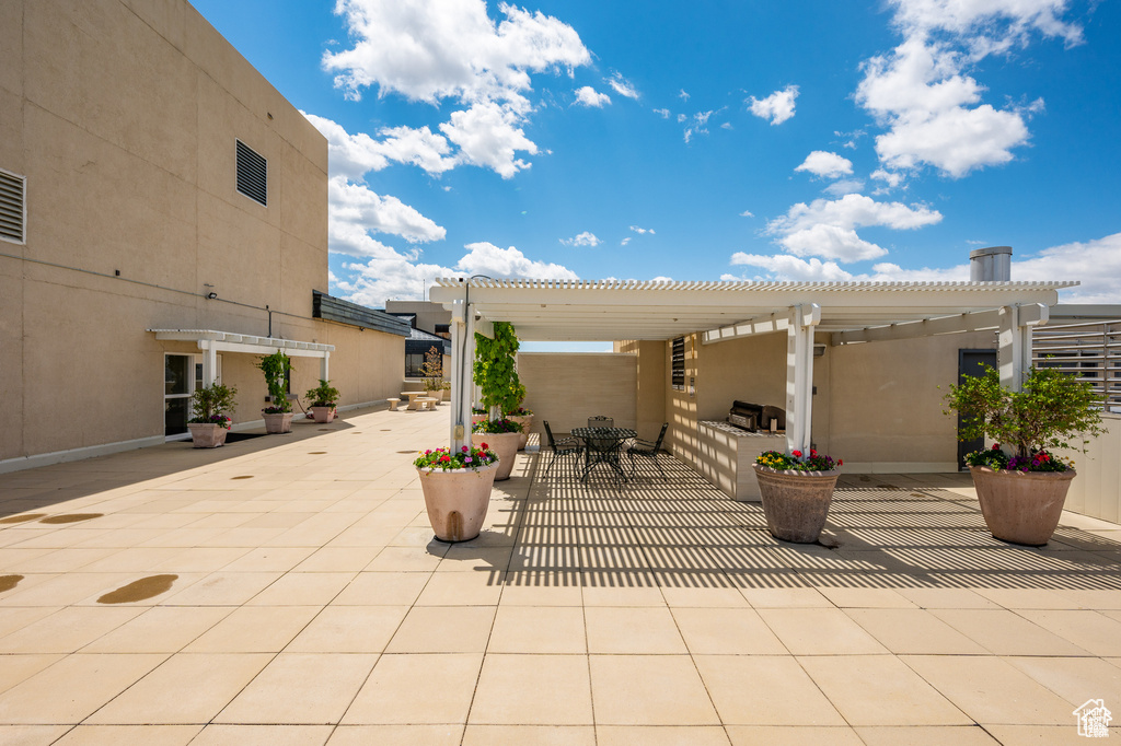 View of patio featuring a pergola