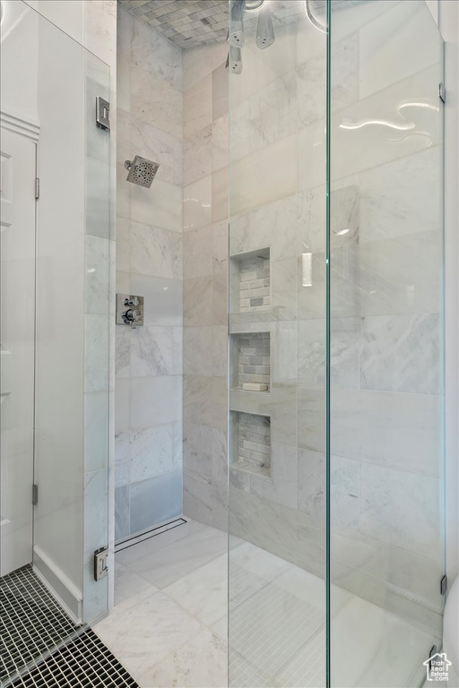 Full bath featuring a stall shower