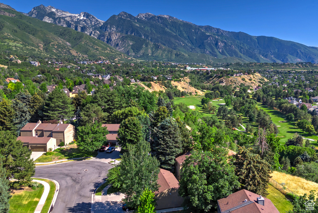 View of mountain background featuring nearby suburban area