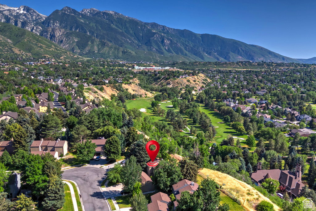 Aerial view of property\\\'s location featuring mountains and nearby suburban area