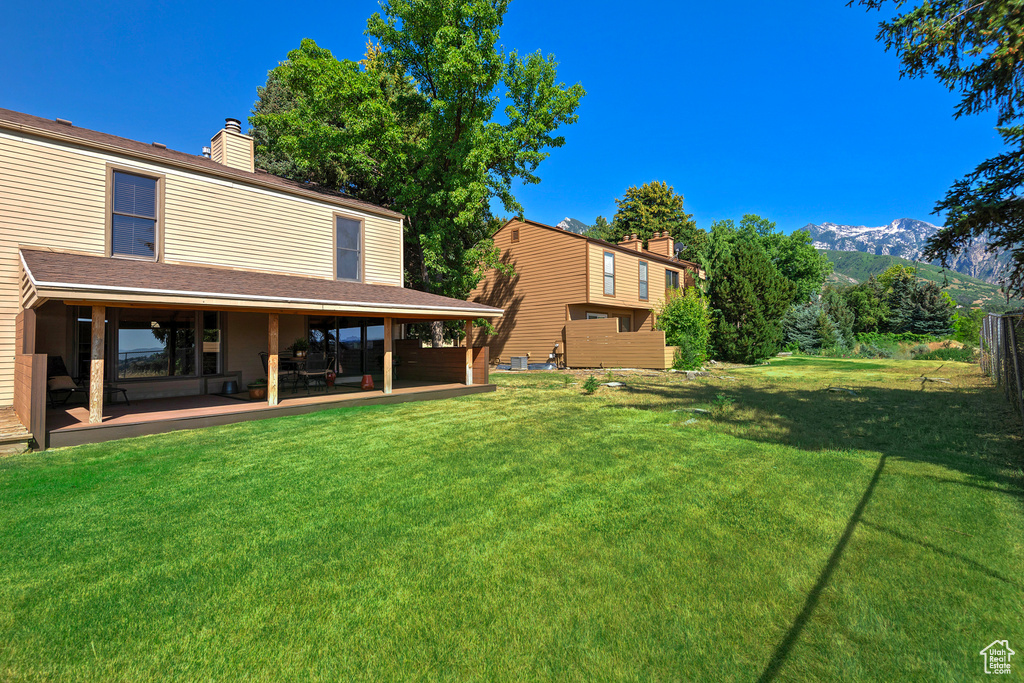 View of yard with a mountain view