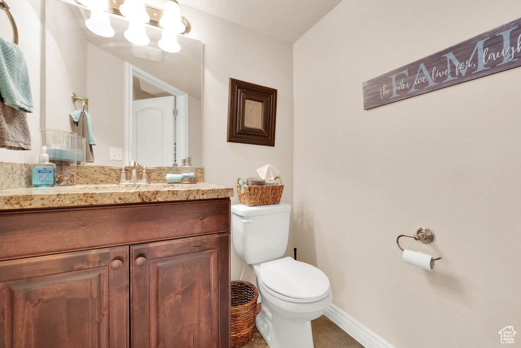 Bathroom with vanity and tile patterned floors