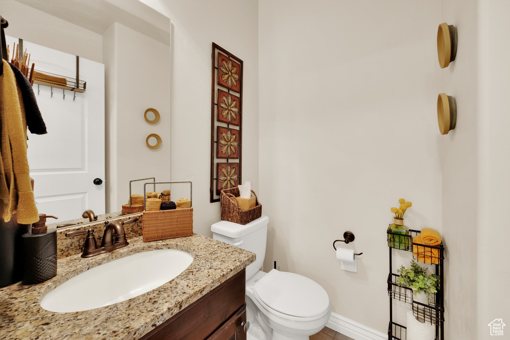 Bathroom featuring vanity and tile patterned flooring