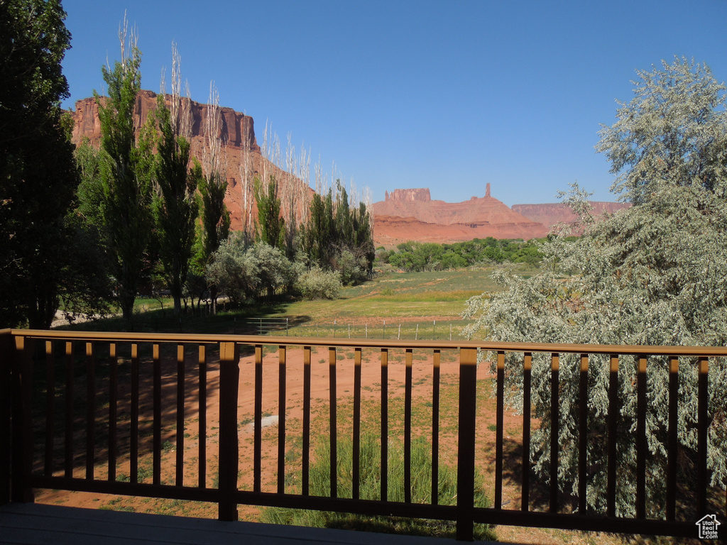View of mountain backdrop featuring rural landscape