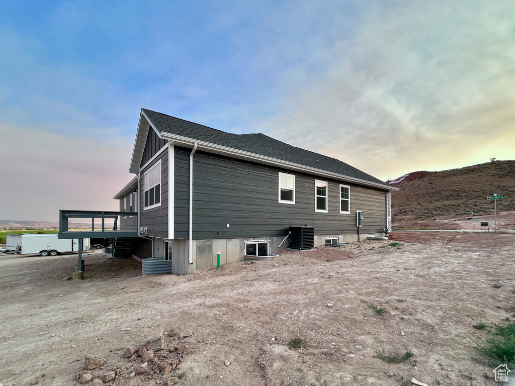 Rear view of house featuring a deck