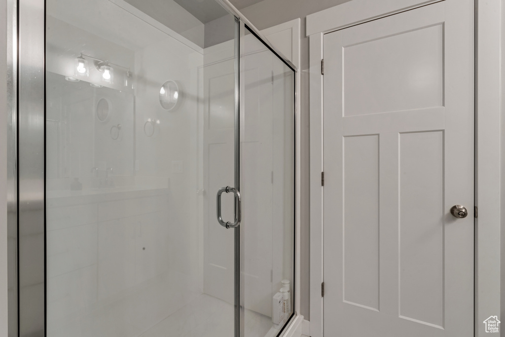 Full bath featuring a stall shower