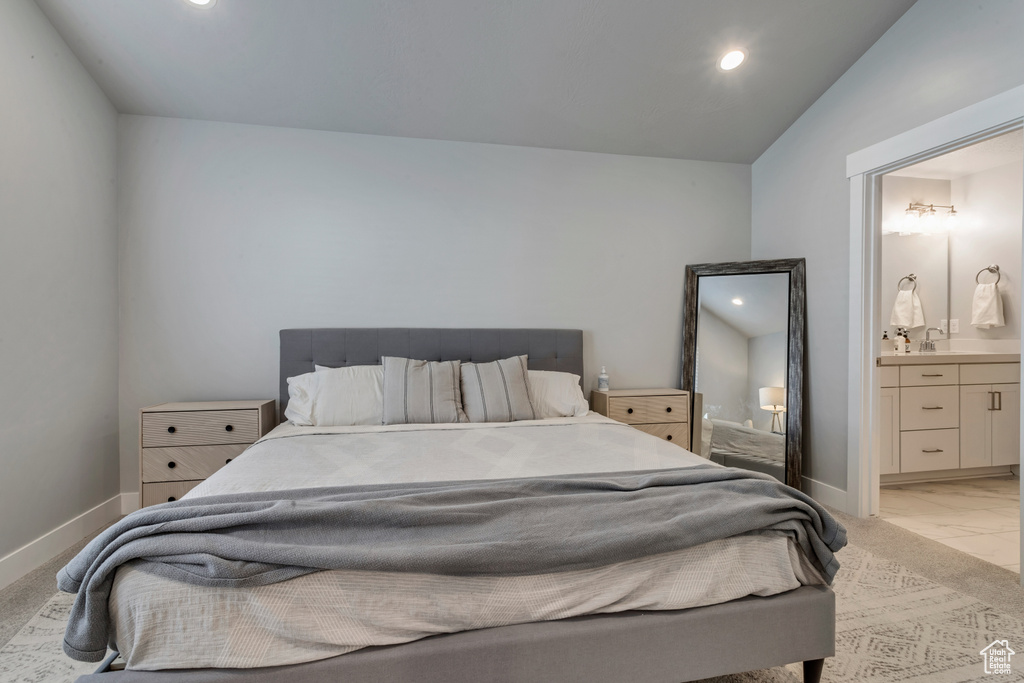 Bedroom with recessed lighting and ensuite bath