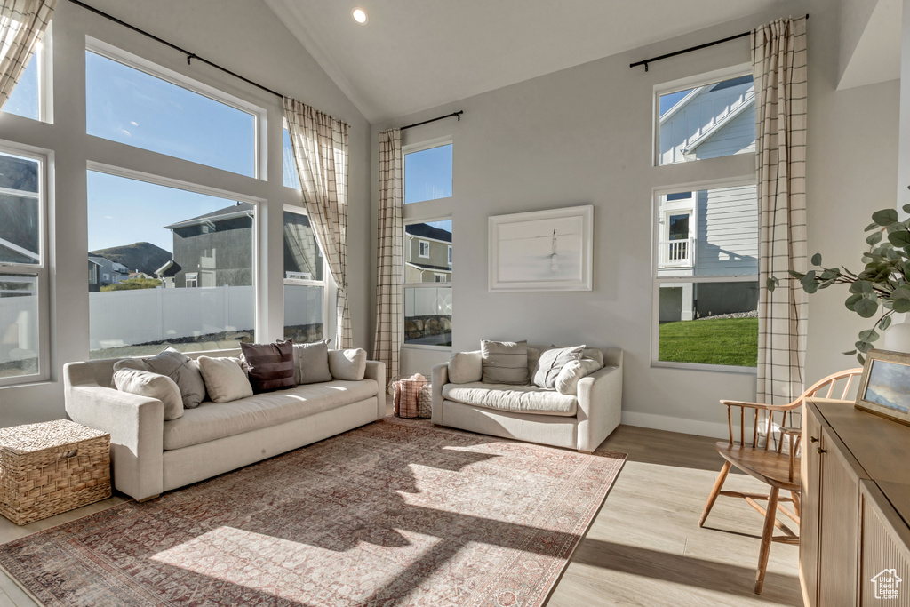 Sunroom with lofted ceiling