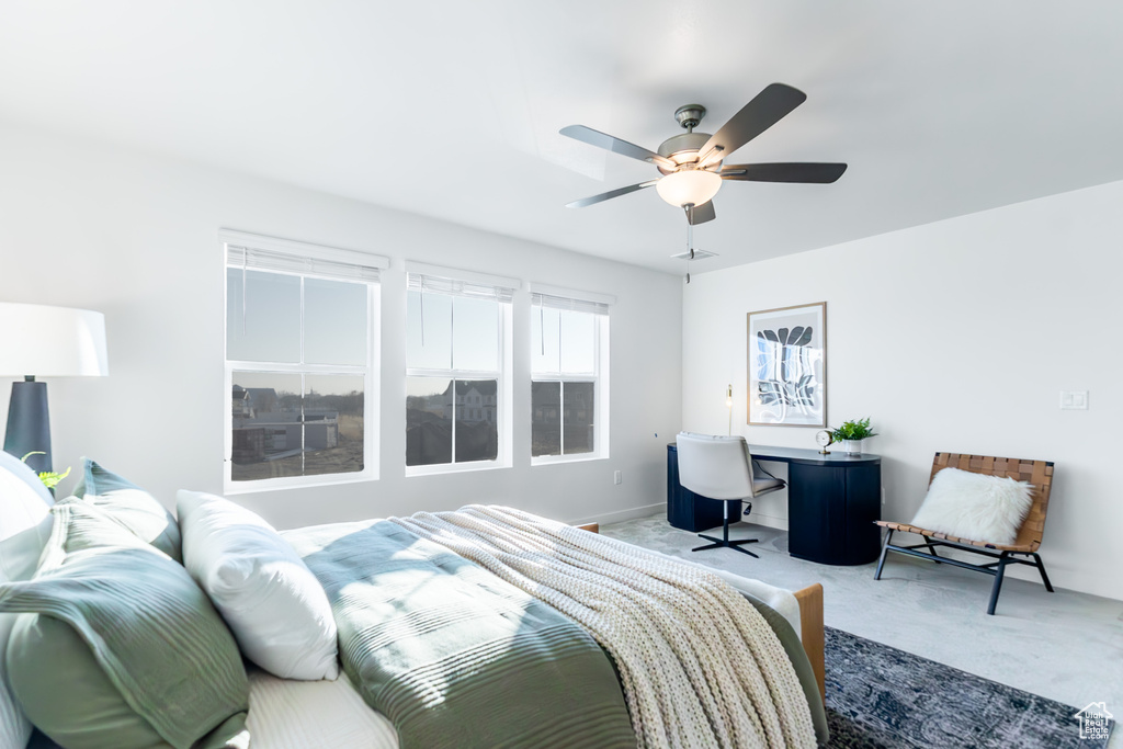 Bedroom featuring carpet and ceiling fan