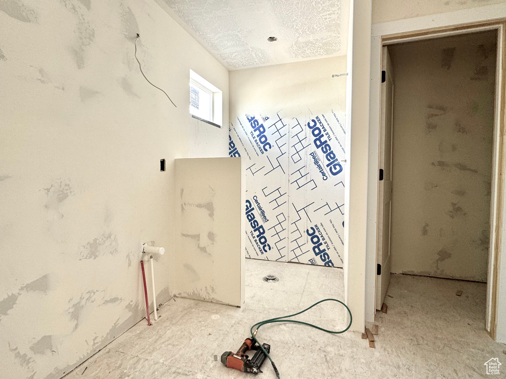 Bathroom with a textured ceiling